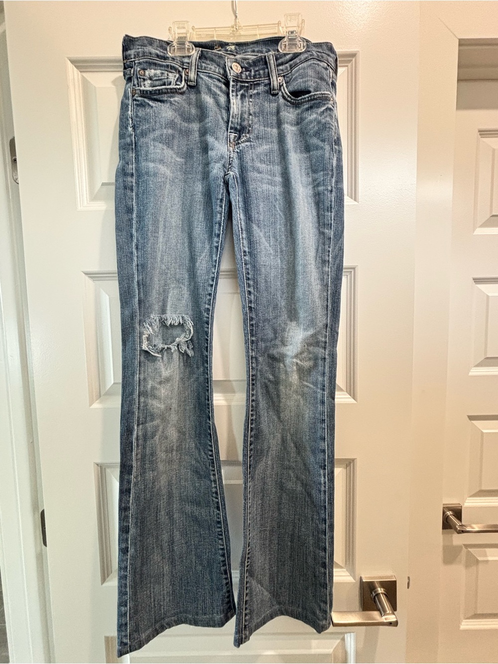 7 For All Mankind Light Blue Bootcut Jeans with Knee Distress